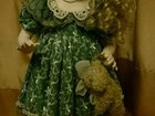 Кукла фарфоровая в зеленом платье