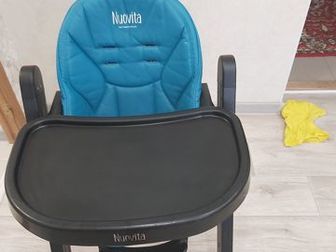 Продаются 2 детских стула для кормления - NUOVITA,  В хорошем состоянии,  Голубого и оранжевого цвета,  Накидка на стульях из эко кожи,  Стирается в стиральной машинке в Волжском